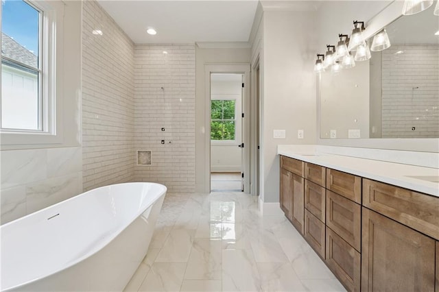 12 Night Fire Ct, Dawsonville, GA 30534 - bathroom with marble tiled floors, double vanity, a freestanding tub, and tiled shower