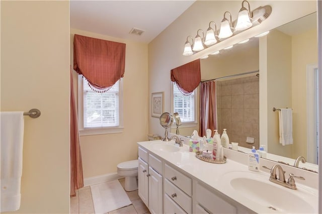 full bathroom with visible vents, a sink, toilet, and tile patterned floors