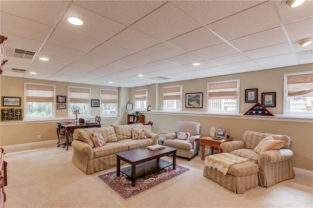 carpeted living room featuring recessed lighting, plenty of natural light, and baseboards