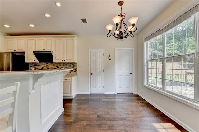 189 Azalea Chase Dr, Suwanee, GA 30024 - kitchen featuring freestanding refrigerator, dark wood-style floors, recessed lighting, backsplash, and pendant lighting