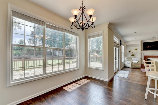 189 Azalea Chase Dr, Suwanee, GA 30024 - unfurnished dining area featuring a chandelier and dark wood-style flooring