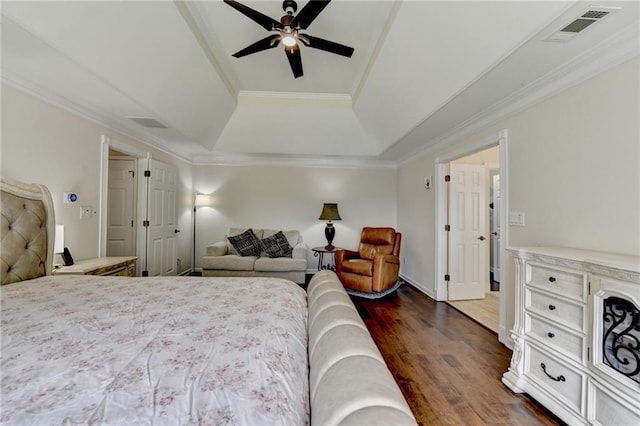 189 Azalea Chase Dr, Suwanee, GA 30024 - bedroom featuring a raised ceiling, dark wood-type flooring, crown molding, and a ceiling fan