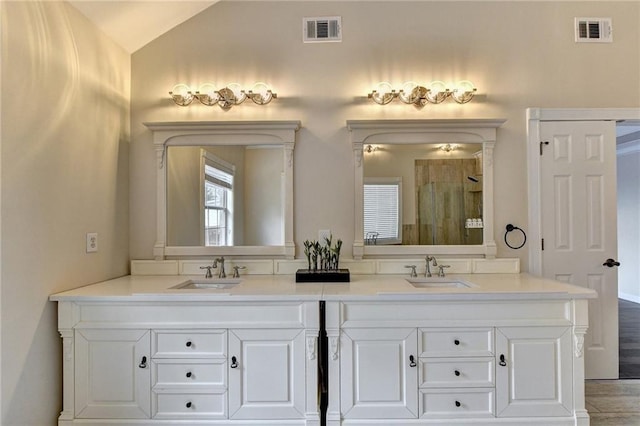 189 Azalea Chase Dr, Suwanee, GA 30024 - bathroom featuring double vanity, a stall shower, and lofted ceiling