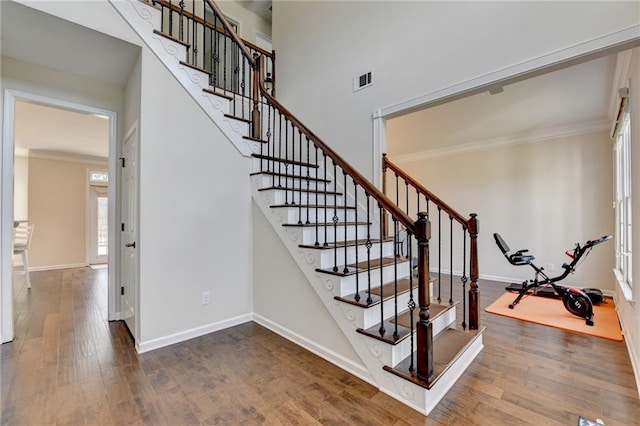 189 Azalea Chase Dr, Suwanee, GA 30024 - stairs featuring wood finished floors and crown molding