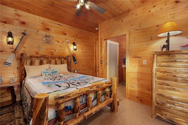 tiled bedroom with wooden walls and wood ceiling