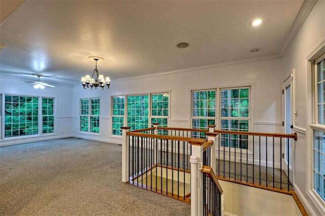 521 Crabapple Rd, Clarkesville, GA 30523 - interior space with an upstairs landing, a chandelier, ornamental molding, carpet, and a wainscoted wall