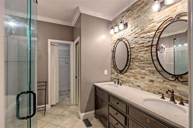 521 Crabapple Rd, Clarkesville, GA 30523 - bathroom with double vanity, ornamental molding, a stall shower, tile patterned floors, and a spacious closet