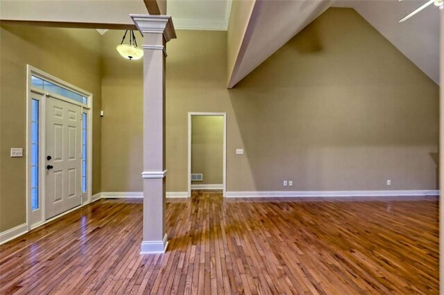 521 Crabapple Rd, Clarkesville, GA 30523 - foyer featuring hardwood / wood-style floors, ornate columns, lofted ceiling, and baseboards