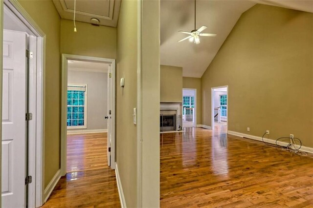 521 Crabapple Rd, Clarkesville, GA 30523 - corridor featuring wood finished floors, attic access, baseboards, high vaulted ceiling, and plenty of natural light