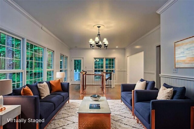 521 Crabapple Rd, Clarkesville, GA 30523 - living room featuring a chandelier, crown molding, and wood finished floors