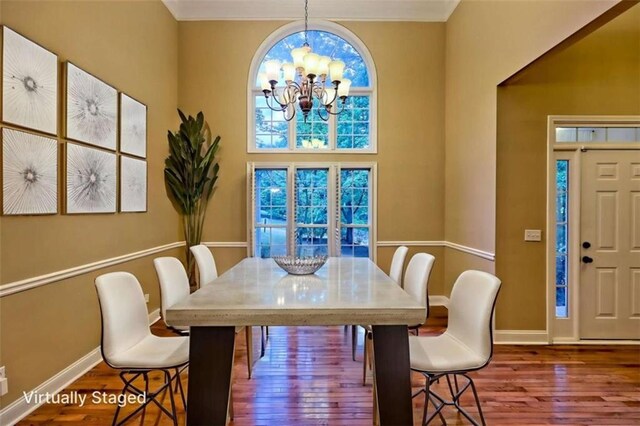 521 Crabapple Rd, Clarkesville, GA 30523 - dining space with a chandelier, wood finished floors, and baseboards