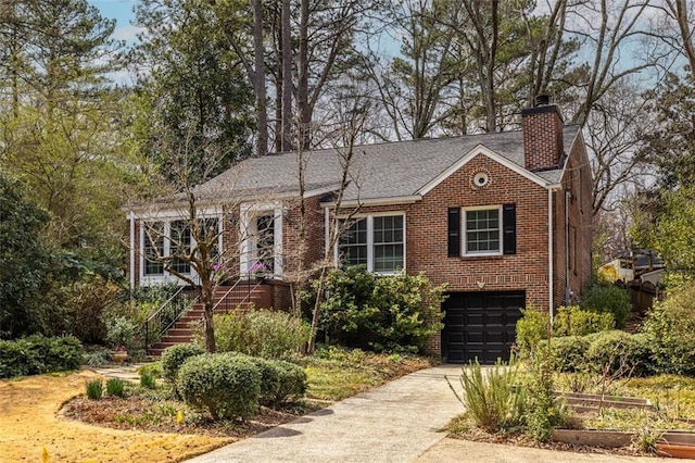 view of front facade with brick siding, a chimney, stairway, a garage, and driveway