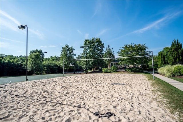 surrounding community featuring volleyball court