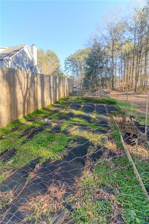 view of yard featuring fence