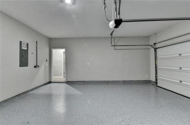 333 Golden Eagle Pkwy, Braselton, GA 30517 - garage featuring electric panel and a garage door opener