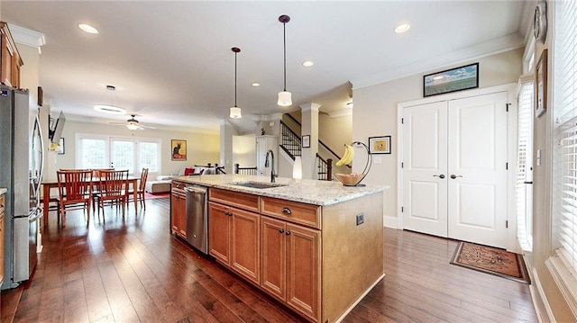 1263 Linden Ct NE, Atlanta, GA 30329 - kitchen featuring a sink, ornamental molding, a ceiling fan, and stainless steel appliances