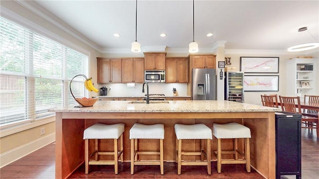 1263 Linden Ct NE, Atlanta, GA 30329 - kitchen with a sink, appliances with stainless steel finishes, crown molding, and plenty of natural light