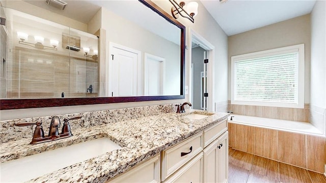 1263 Linden Ct NE, Atlanta, GA 30329 - full bathroom featuring visible vents, a sink, double vanity, and a shower stall
