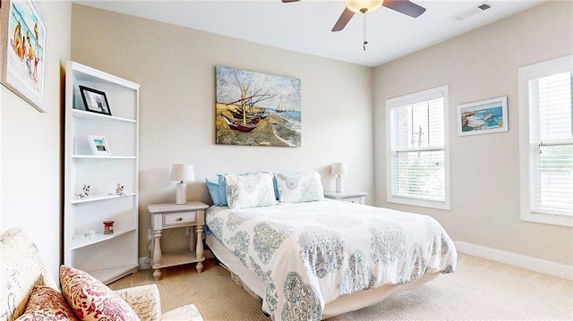 1263 Linden Ct NE, Atlanta, GA 30329 - carpeted bedroom featuring baseboards, ceiling fan, and visible vents