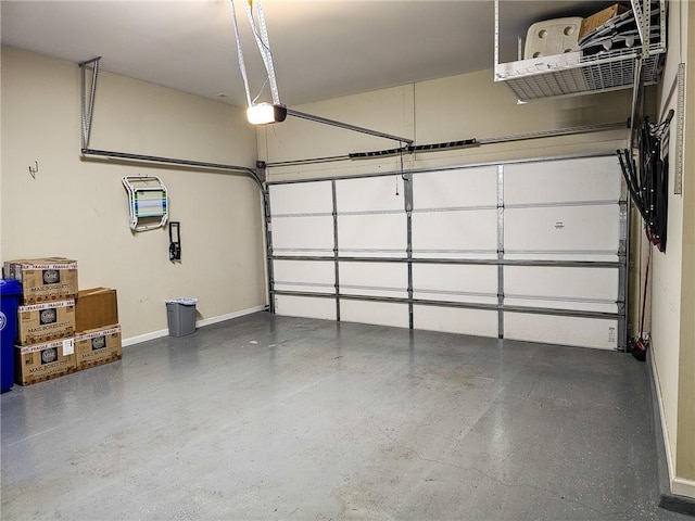 1263 Linden Ct NE, Atlanta, GA 30329 - garage featuring baseboards and a garage door opener