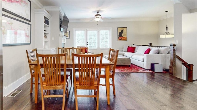 1263 Linden Ct NE, Atlanta, GA 30329 - dining room with baseboards, ornamental molding, a ceiling fan, and dark wood-style flooring
