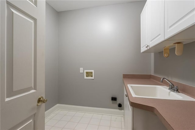 laundry room with light tile patterned flooring, sink, cabinets, hookup for a washing machine, and hookup for an electric dryer