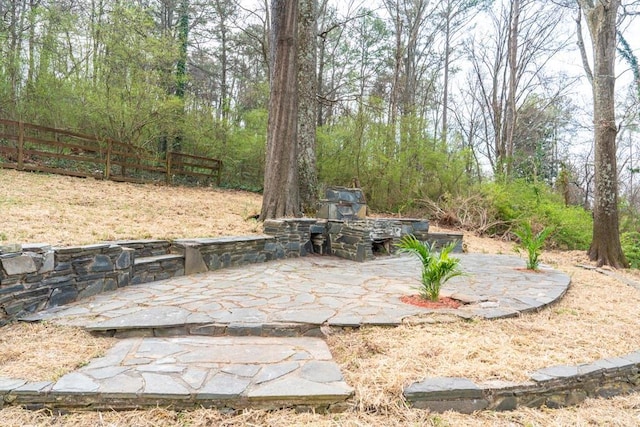 view of yard with a patio and fence