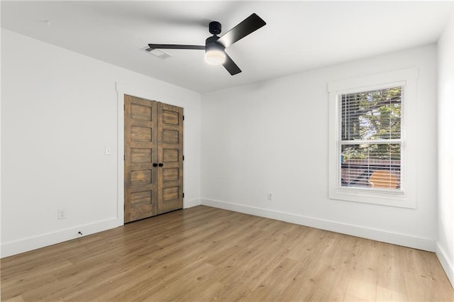 unfurnished room featuring ceiling fan and light hardwood / wood-style floors