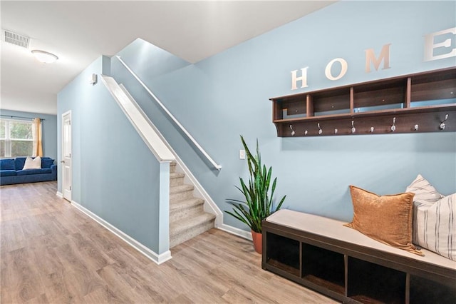 mudroom with light wood-type flooring