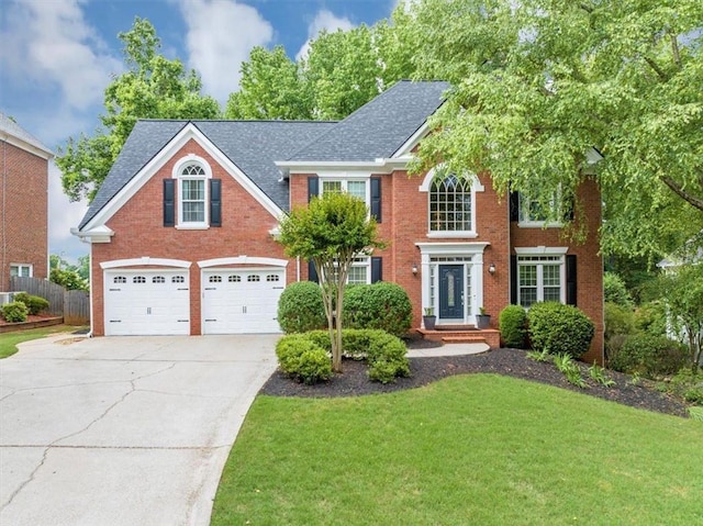 10400 Groomsbridge Rd, Alpharetta, GA 30022 - colonial house with concrete driveway, brick siding, an attached garage, and a shingled roof