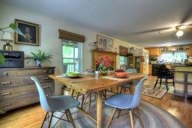 dining area featuring light wood-type flooring