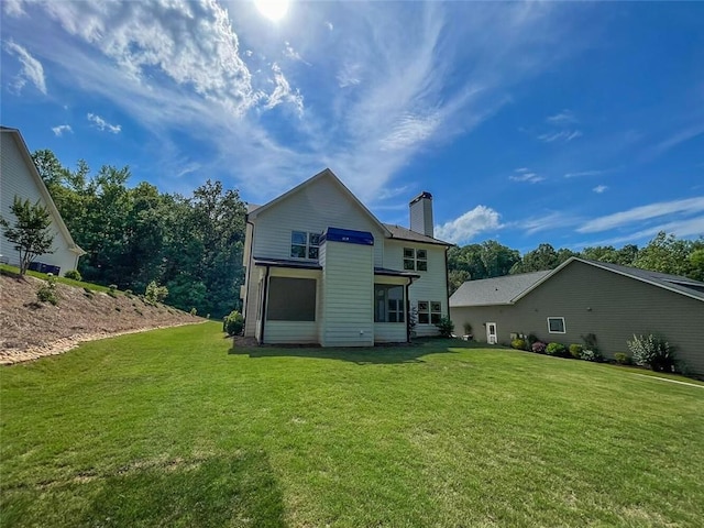 5354 Shadow Walk Way, Gainesville, GA 30507 - rear view of house featuring a chimney and a lawn