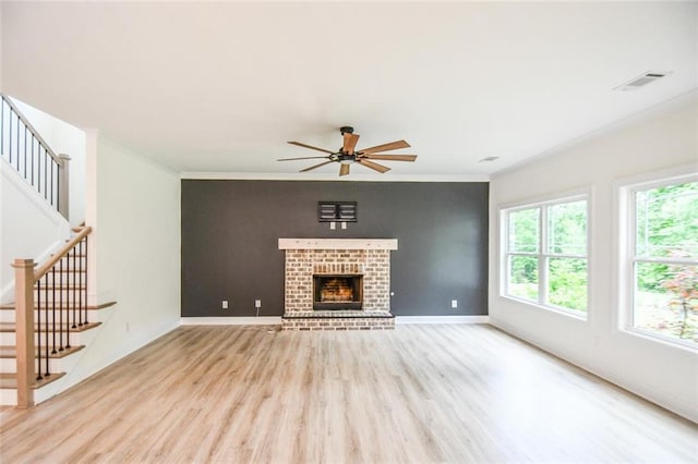 5354 Shadow Walk Way, Gainesville, GA 30507 - unfurnished living room featuring wood finished floors, a ceiling fan, stairway, ornamental molding, and baseboards