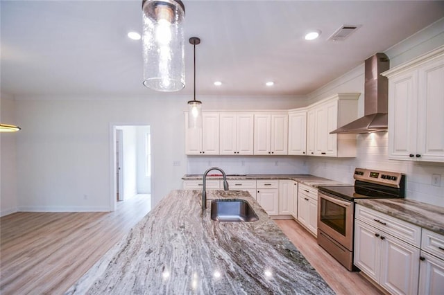 5354 Shadow Walk Way, Gainesville, GA 30507 - kitchen featuring stainless steel electric stove, wall chimney exhaust hood, a sink, light wood-style floors, and tasteful backsplash