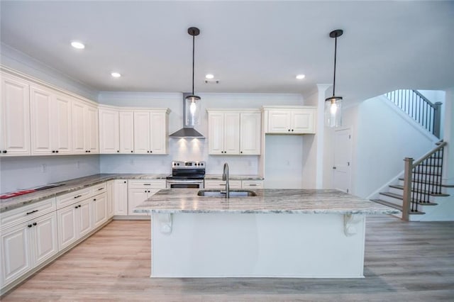 5354 Shadow Walk Way, Gainesville, GA 30507 - kitchen featuring wall chimney range hood, stainless steel range with electric cooktop, a sink, light stone counters, and light wood-type flooring