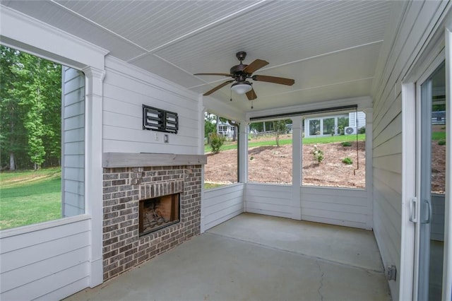 5354 Shadow Walk Way, Gainesville, GA 30507 - unfurnished sunroom with an outdoor brick fireplace and ceiling fan