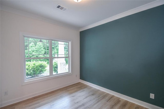5354 Shadow Walk Way, Gainesville, GA 30507 - empty room featuring wood finished floors, crown molding, and baseboards