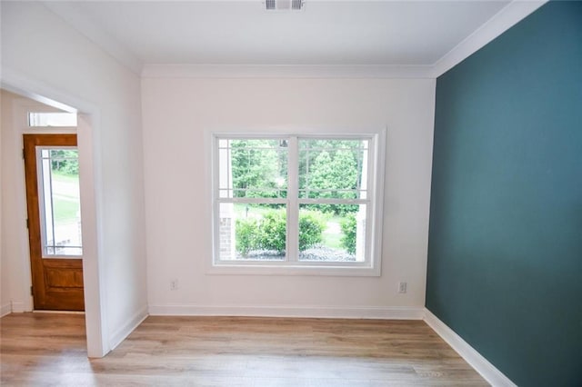 5354 Shadow Walk Way, Gainesville, GA 30507 - spare room with ornamental molding, light wood-style floors, and baseboards