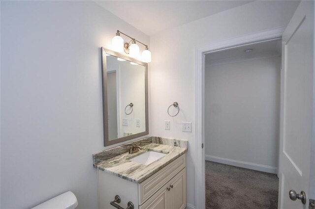 5354 Shadow Walk Way, Gainesville, GA 30507 - bathroom with vanity, toilet, and baseboards