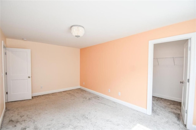5354 Shadow Walk Way, Gainesville, GA 30507 - unfurnished bedroom featuring carpet floors, a spacious closet, baseboards, and a closet