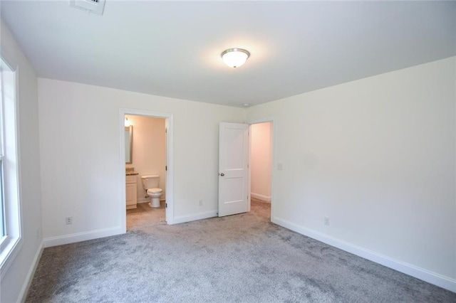 5354 Shadow Walk Way, Gainesville, GA 30507 - unfurnished bedroom featuring light carpet, baseboards, and ensuite bathroom