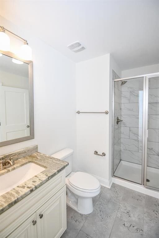 5354 Shadow Walk Way, Gainesville, GA 30507 - full bathroom with vanity, a shower stall, toilet, and baseboards