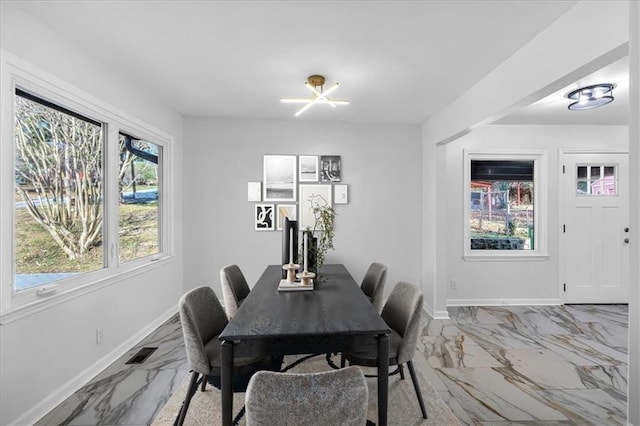 dining room with an inviting chandelier