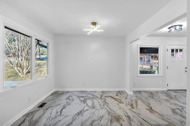 interior space with a chandelier