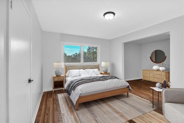 bedroom with wood-type flooring