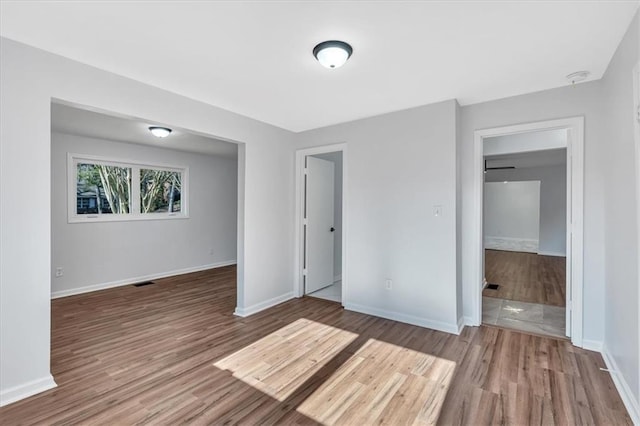 interior space featuring hardwood / wood-style floors and a closet