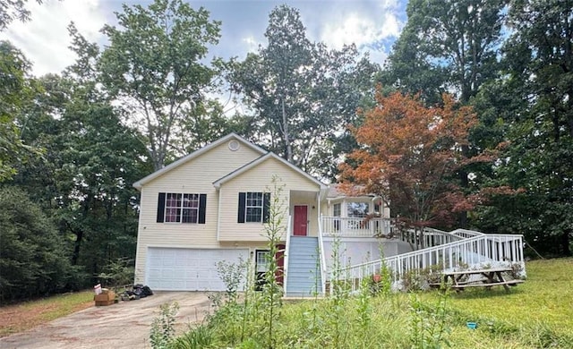 view of front of property with a garage