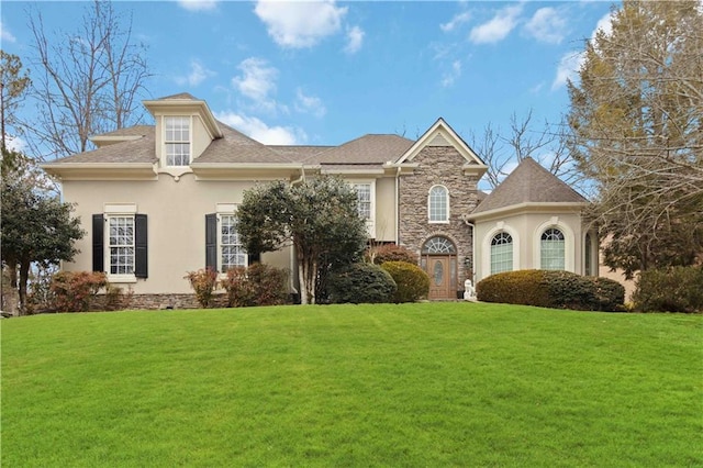 view of front of home with a front lawn