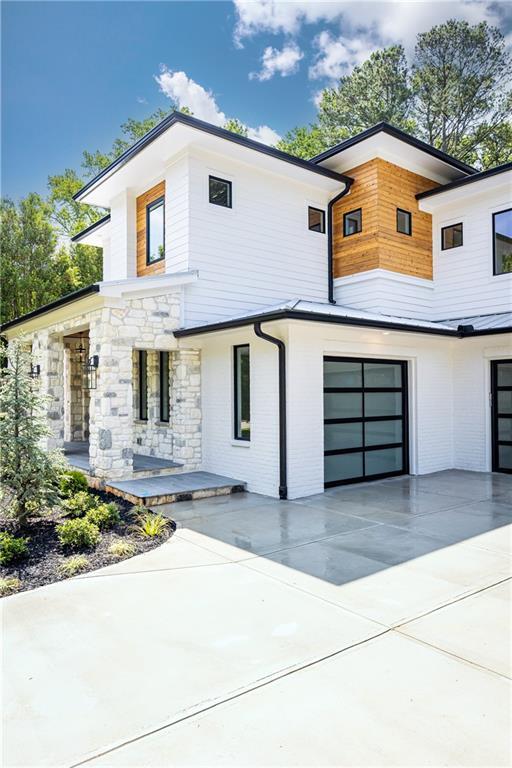 modern home featuring a garage