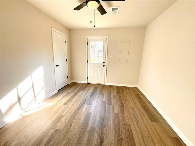 unfurnished room featuring wood-type flooring and ceiling fan